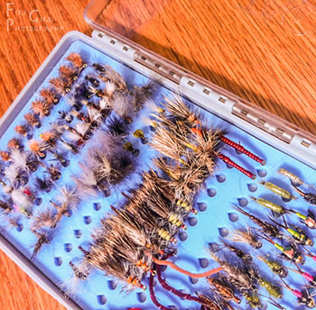 One of my favorite products of the show was the new Tacky Fly Box, headed by an awesome group of guys from Utah. Orvis will be carrying it, so I’ve written the copy for catalog and web, but was lucky enough to get one from the guys. A first order of business upon getting back to Vermont was to load it up. With silicone instead of foam, I expect this box to be lost on some adventure well before it “dies.” 